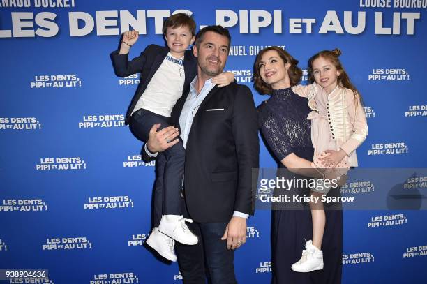 Timeo Bolland, Arnaud Ducret, Louise Bourgoin and Saskia de Melo Dillais attend the "Les Dents, Pipi Et Au Lit" Paris Premiere at UGC Cine Cite des...