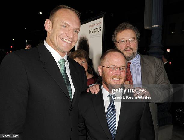 Springbok's captain Francois Pienaar, screenwriter Anthony Peckham and writer John Carlin arrive at the premiere of Warner Bros. Pictures' and...