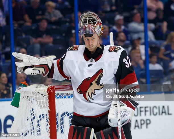Goalie Antti Raanta of the Arizona Coyotes drinks water against the Tampa Bay Lightning at Amalie Arena on March 26, 2018 in Tampa, Florida. "n