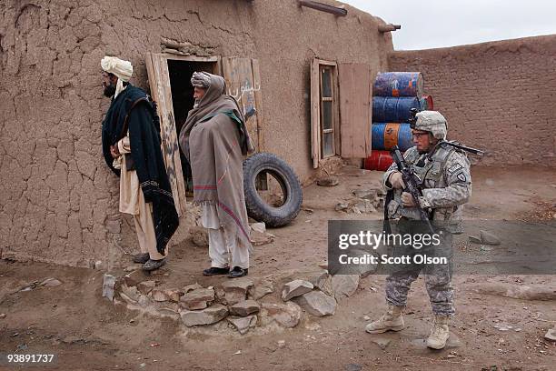 Sgt. Joseph Delair of Syracuse, NY from the Army's Blackfoot Company 1st Battalion 501st Parachute Infantry Regiment keeps watch while on a joint...