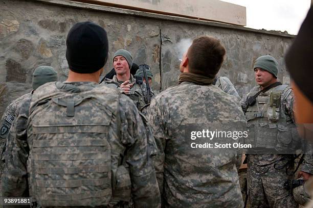 2nd Lt. Josh Talyor from Nixa, MO of the Army's Blackfoot Company 1st Battalion 501st Parachute Infantry Regiment speaks to his men prior to a joint...