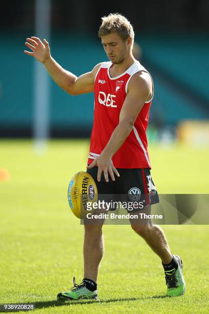 Kieren Jack of the Swans kicks during a Sydney Swans AFL training session at SCG on March 28, 2018 in Sydney, Australia.