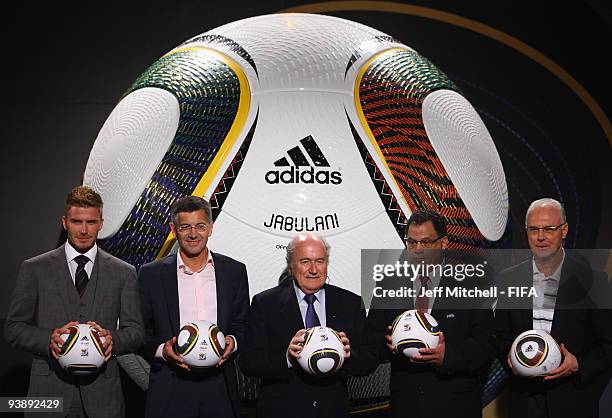 David Beckham and Joseph S Blatter at the official hand over of the 210 FIFA World Cup match ball at the Waterfront studios on December 4, 2009 in...