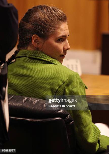 Defendant Amanda Knox takes a seat next to her lawyer on the final day of the Meredith Kercher murder trial on December 4, 2009 in Perugia, Italy....