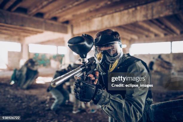 paintball player - paintball stock pictures, royalty-free photos & images