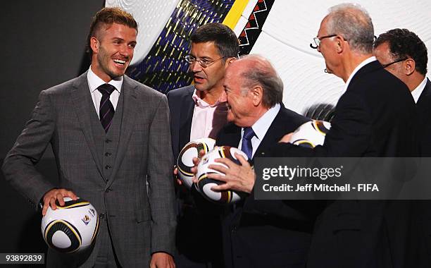 David Beckham and Joseph S Blatter attend the Official hand over of the 210 FIFA World Cup match ball at the Waterfront studios on December 4, 2009...