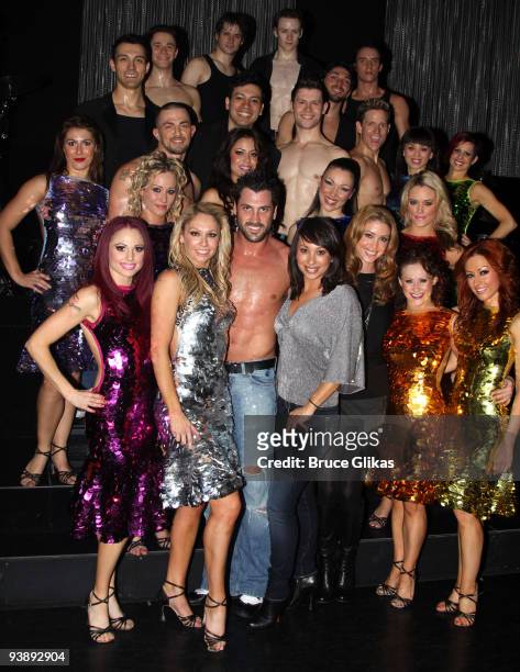 Kym Johnson, Maksim Chmerkovskiy, Cheryl Burke and Shannon Elizabeth pose with the cast backstage at the hit dance sensation "Burn The Floor" on...