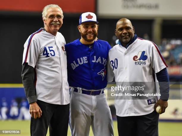 Steve Rogers , Russell Martin of the Toronto Blue Jays and Tim Raines pose for photos during the MLB preseason game against the St. Louis Cardinals...