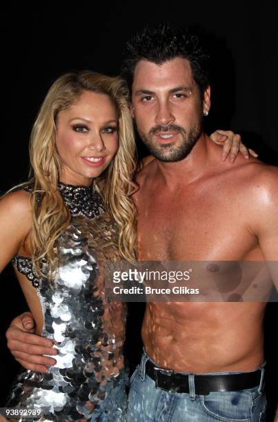 Kym Johnson and Maksim Chmerkovskiy pose backstage at the hit dance sensation "Burn The Floor" on Broadway at The Longacre Theater on December 3,...