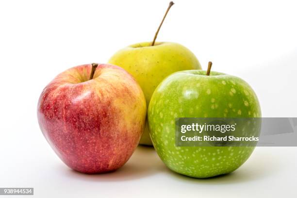 three different coloured apples - apple isolated stock pictures, royalty-free photos & images