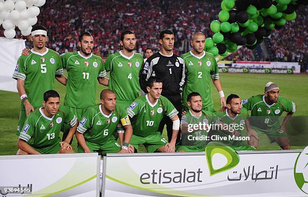 The Algeria football team line up for a team photograph prior to the FIFA2010 World Cup qualifying match between Egypt and Algeria at the Cairo...