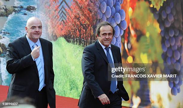 Secretary General Gianni Infantino and President Michel Platini arrive at the Cape Town International Convention Centre for the World Cup 2010 draw...