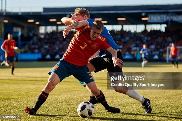 Mark Oliver Roosnupp of Estonia U21 competes for the ball with Toni Lato of Spain U21 during the 2019 UEFA Under 21 qualification match between Spain...