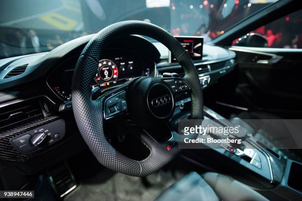 The steering wheel and interior of Audi AG R5S sport vehicle is seen after the vehicle was unveiled during an event in New York, U.S., on Tuesday,...