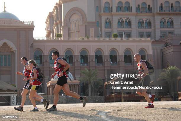 Team Briard of France run in front of the Emirates Palace Hotel during the running section of stage one on December 4, 2009 in Abu Dhabi, United Arab...