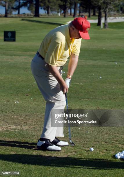 Businessman Donald Trump hits balls on a driving range during the 2006 American Century Celebrity Golf Tournament played at the Edgewood Tahoe golf...