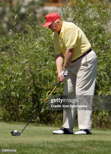 Businessman Donald Trump gets ready to hit the ball during the 2006 American Century Celebrity Golf Tournament played at the Edgewood Tahoe golf...