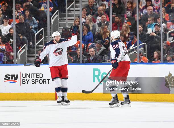 Thomas Vanek David Savard of the Columbus Blue Jackets celebrate after a goal during the game against the Edmonton Oilers on March 27, 2018 at Rogers...