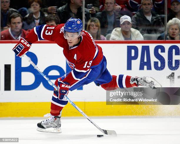 Mike Cammalleri of the Montreal Canadiens shoots the ppuck during the NHL game against the Columbus Blue Jackets on November 24, 2009 at the Bell...