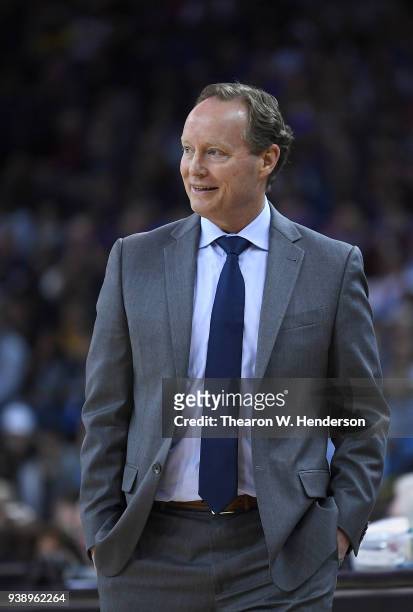Head coach Mike Budenholzer of the Atlanta Hawks looks on against the Golden State Warriors during an NBA basketball game at ORACLE Arena on March...