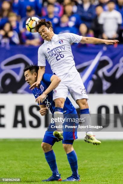 Yeom Ki-Hun of Suwon Samsung Bluewings fights for the ball with Qin Sheng of Shanghai Shenhua FC during the AFC Champions League 2018 Group H match...