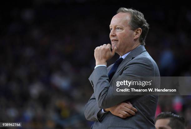 Head coach Mike Budenholzer of the Atlanta Hawks looks on against the Golden State Warriors during an NBA basketball game at ORACLE Arena on March...