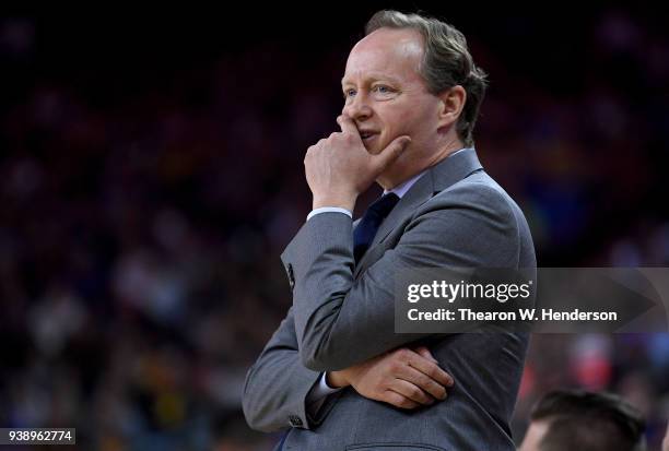 Head coach Mike Budenholzer of the Atlanta Hawks looks on against the Golden State Warriors during an NBA basketball game at ORACLE Arena on March...