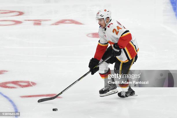 Travis Hamonic of the Calgary Flames handles the puck during a game against the Los Angeles Kings at STAPLES Center on March 26, 2018 in Los Angeles,...