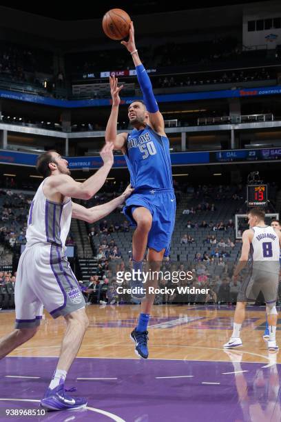 Salah Mejri of the Dallas Mavericks goes to the basket against the Sacramento Kings on March 27, 2018 at Golden 1 Center in Sacramento, California....