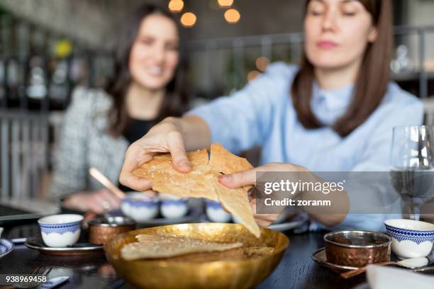 eating lavash - lavash stock pictures, royalty-free photos & images