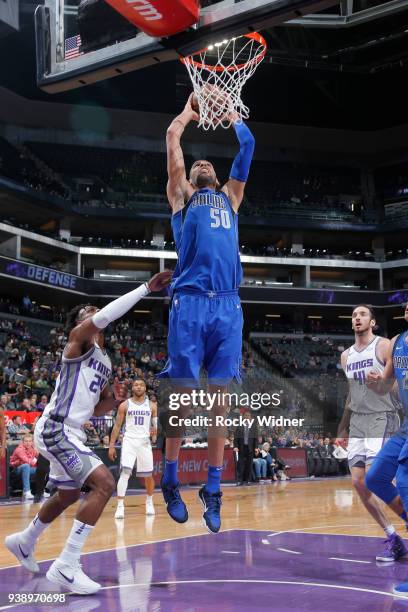 Salah Mejri of the Dallas Mavericks goes to the basket for a dunk during the game against the Sacramento Kings on March 27, 2018 at Golden 1 Center...