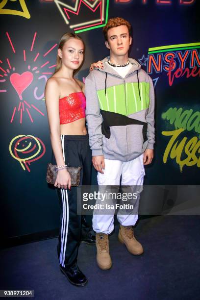 Model Cheyenne Savannah Ochsenknecht with Justin Timberlake wax figure during the 'VIP 90's Let's Glow' Opening Party at Madame Tussauds on March 27,...