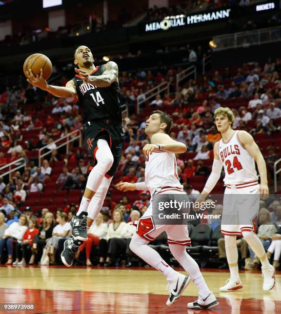Gerald Green of the Houston Rockets goes up for a lay up defended by Ryan Arcidiacono of the Chicago Bulls and Lauri Markkanen in the second half at...