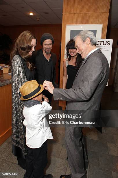 Angelina Jolie, Maddox Jolie-Pitt, Brad Pitt and Director Clint Eastwood at Warner Bros. Pictures Los Angeles Premiere of 'Invictus' on December 03,...