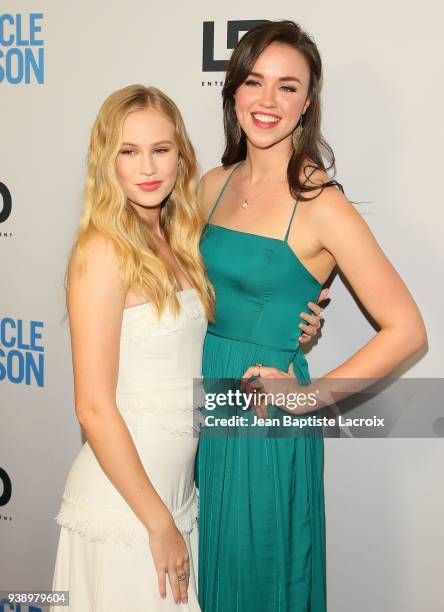 Danika Yarosh and Lillian Doucet-Roche attend the world premiere of 'The Miracle Season' on March 27, 2018 in West Hollywood, California.