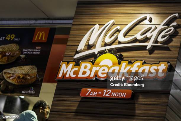 Sign advertises the McCafe McBreakfast at a McDonald's Corp. Restaurant, operated by Hardcastle Restaurants Pvt., in Mumbai, India, on Tuesday, March...