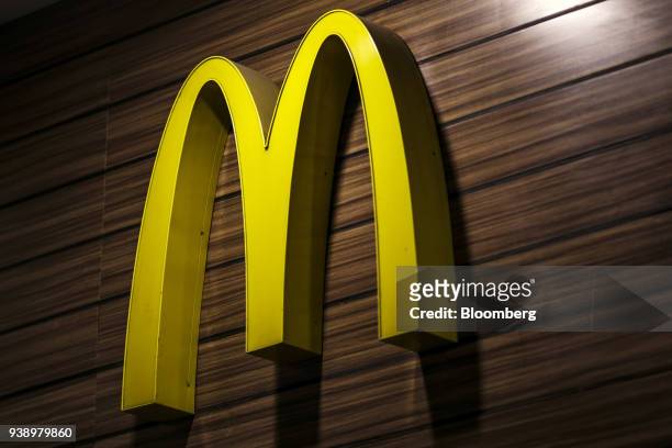 Golden Arches' logo is displayed at a McDonald's Corp. Restaurant, operated by Hardcastle Restaurants Pvt., in Mumbai, India, on Tuesday, March 20,...