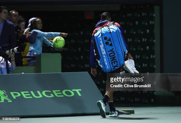 Nick Kyrgios of Australia walks off court after his straight sets defeat against Alexander Zverev of Germany in their fourth round match during the...
