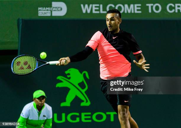 Nick Kyrgios of Australia hits a forehand to Alexander Zverev of Germany during Day 9 of the Miami Open Presented by Itau at Crandon Park Tennis...