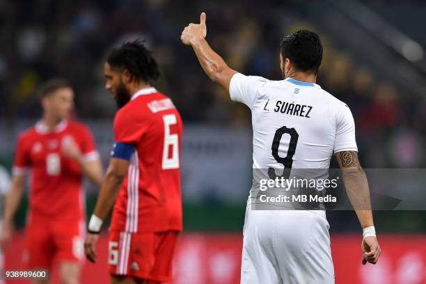 Luis Suarez of Uruguay national football team poses to celebrate after defeating Wales national football team in their final match during the 2018...