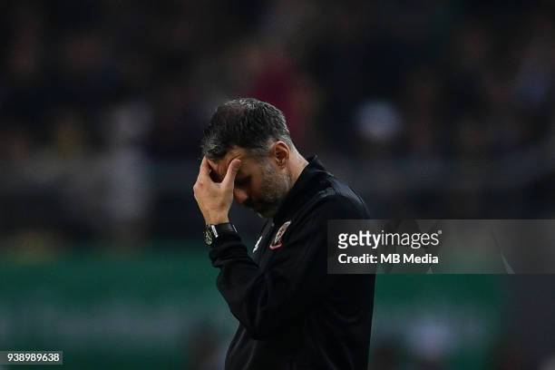 Head coach Ryan Giggs of Wales national football team reacts as he watches his players competing against Uruguay national football team in their...