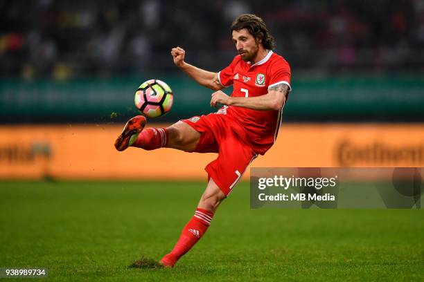 Joe Allen of Wales national football team kicks the ball to make a shoot against Uruguay national football team in their final match during the 2018...