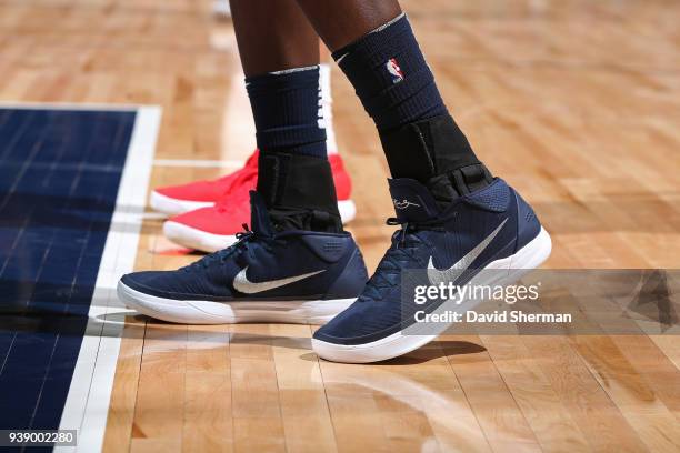 The sneakers of Gorgui Dieng of the Minnesota Timberwolves are seen during the game against the Houston Rockets on March 18, 2018 at Target Center in...