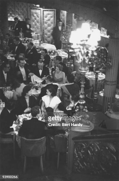 Busy evening at the Cafe de Paris nightclub in London, February 1951. Original publication: Picture Post - 5202 - Cabaret Time In London - pub. 3rd...