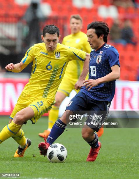 Shoya Nakajima of Japan in action during the International friendly match between Japan and Ukraine held at Stade Maurice Dufrasne on March 27, 2018...