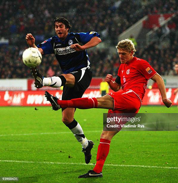 Pavel Fort of Bielefeld and Johannes van den Bergh of Duesseldorf battle for the ball during the Second Bundesliga match between Fortuna Duesseldorf...