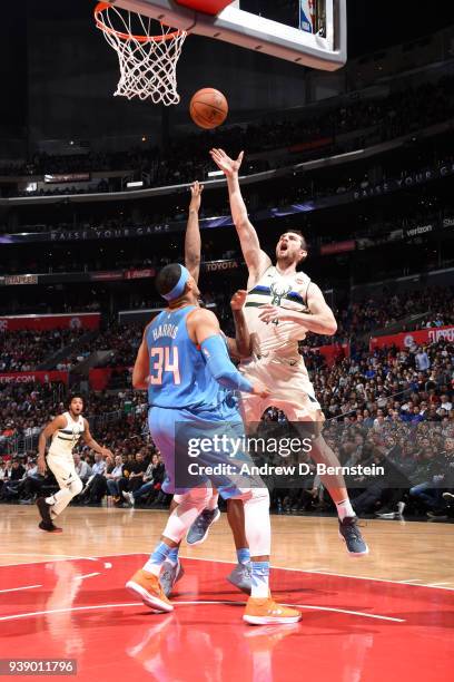 Tyler Zeller of the Milwaukee Bucks goes to the basket against the LA Clippers on March 27, 2018 at STAPLES Center in Los Angeles, California. NOTE...