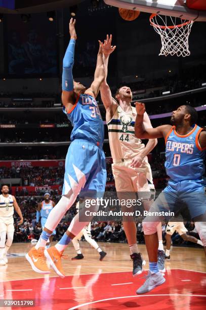 Tyler Zeller of the Milwaukee Bucks goes to the basket against the LA Clippers on March 27, 2018 at STAPLES Center in Los Angeles, California. NOTE...