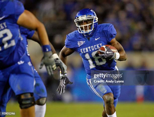 Randall Cobb of the Kentucky Wildcats runs with the ball during the SEC game against the Mississippi State Bulldogs at Commonwealth Stadium on...