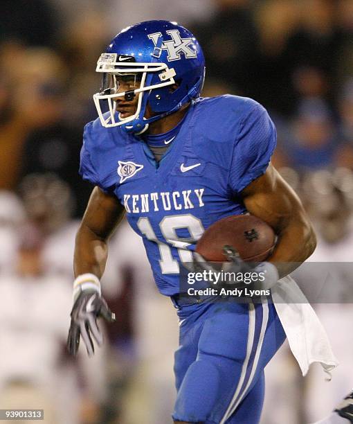 Randall Cobb of the Kentucky Wildcats runs with the ball during the SEC game against the Mississippi State Bulldogs at Commonwealth Stadium on...